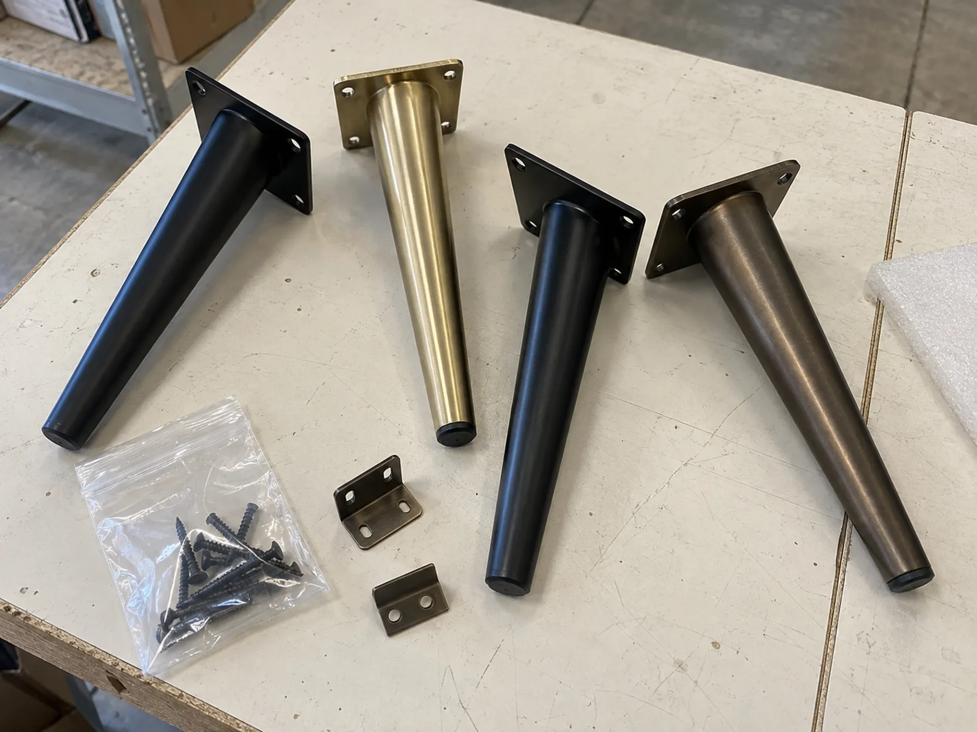 Tapered metal furniture legs in matte black, brass and bronze with fittings