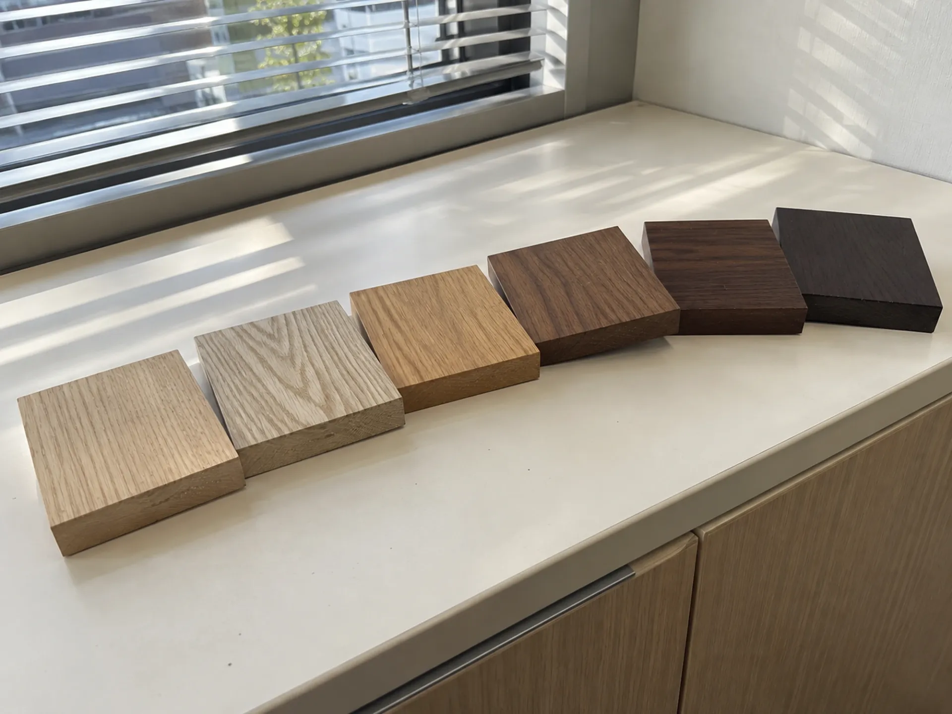 Wood finish sample blocks from pale oak to dark espresso