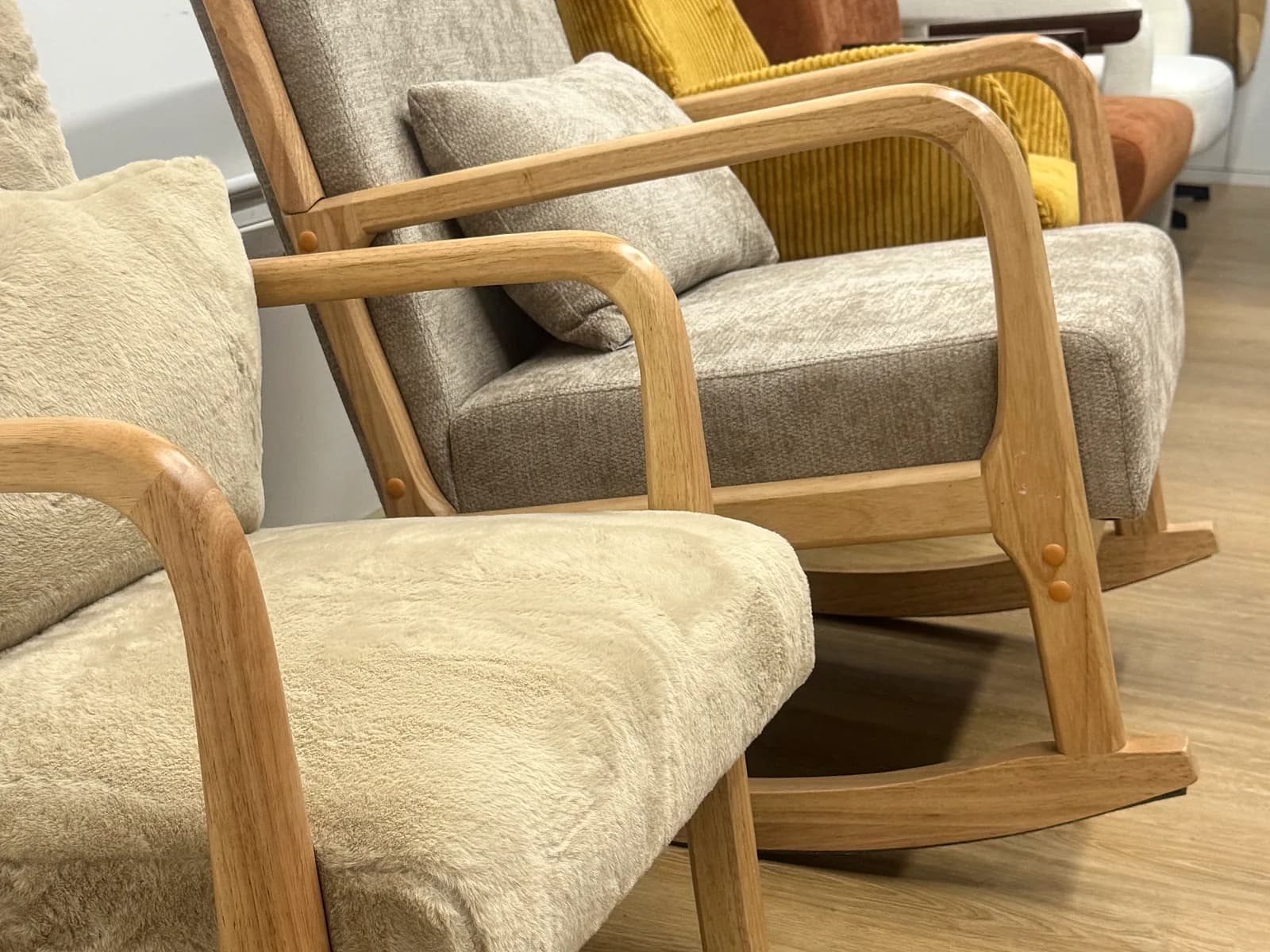 Wooden-frame rocking chairs and lounge armchairs on display at the CasaViva Selection Studio in Guangzhou